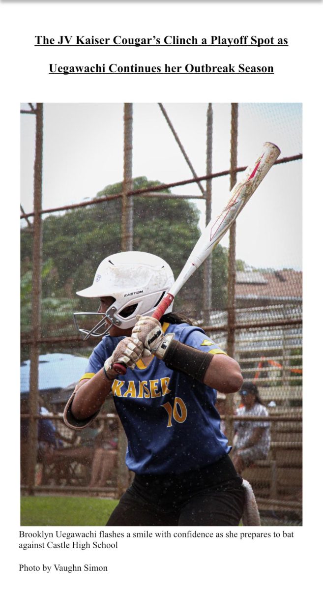 Kaiser's Brooklyn Uegawachi flashes a smile as she prepares to bat against Castle High School's pitcher in the bottom of the 1st Inning. 